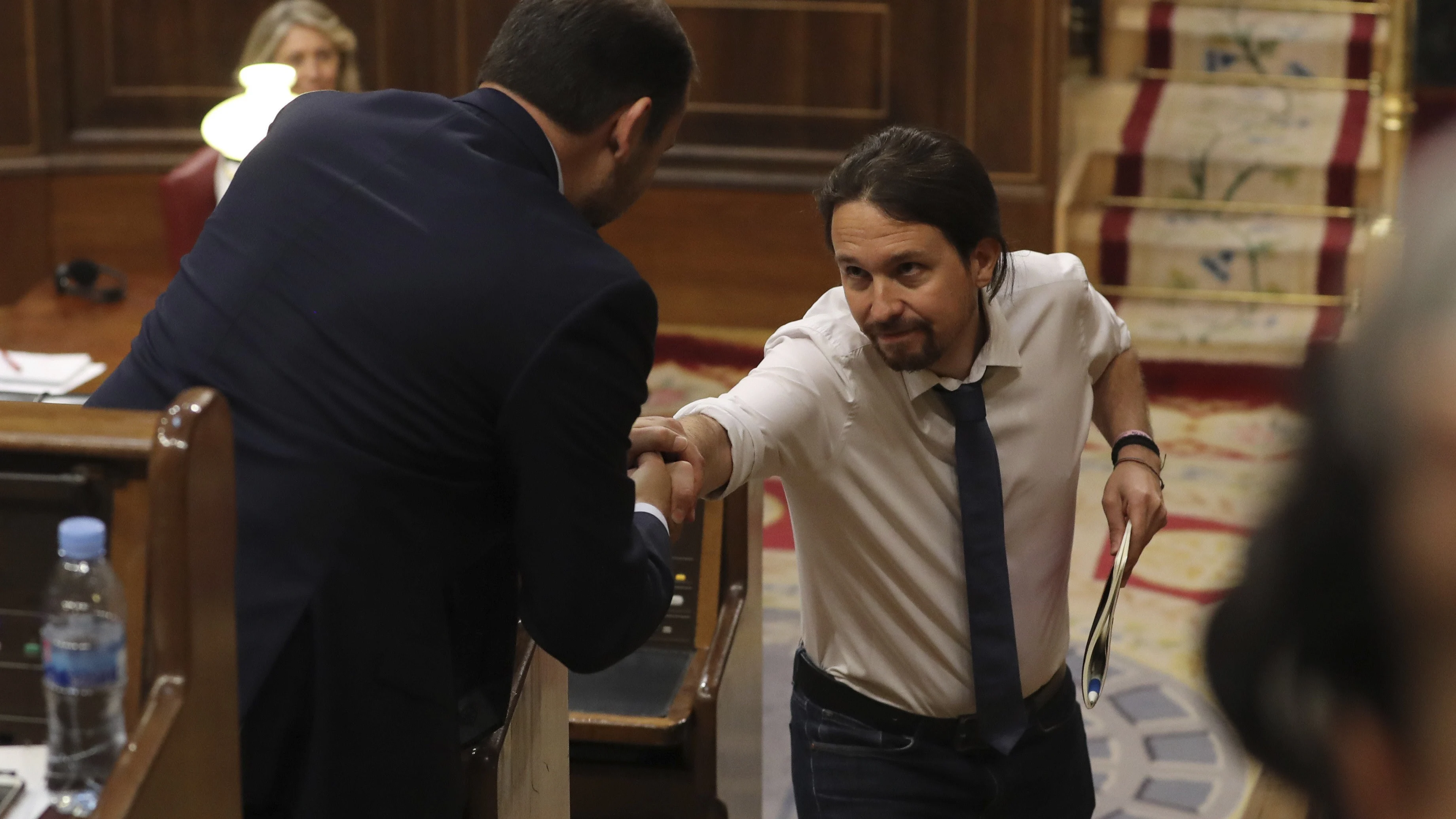 El líder de Podemos, Pablo Iglesias, y el portavoz del PSOE, José Luis Ábalos