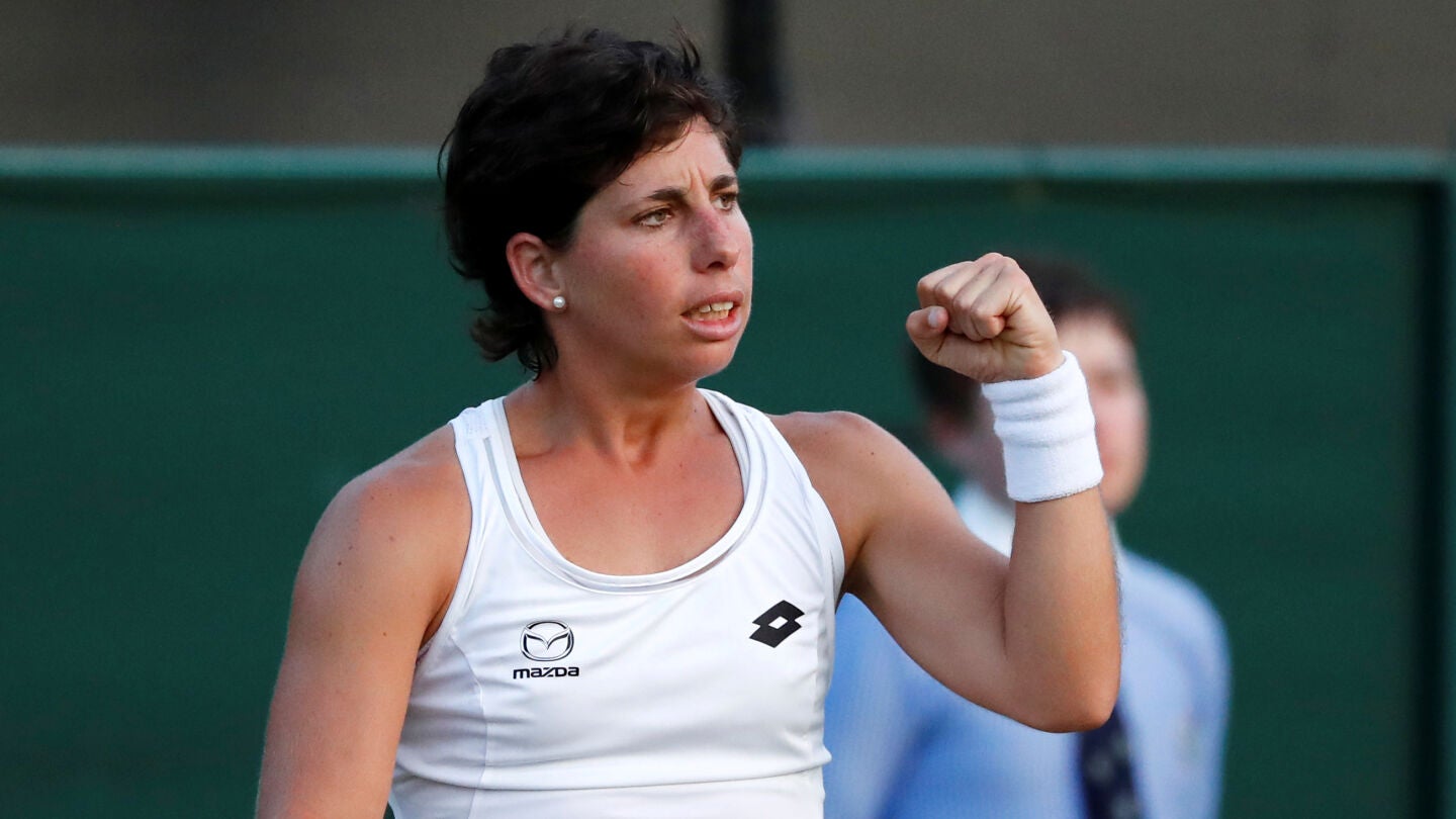 Carla Su&aacute;rez celebra su victoria ante Bouchard