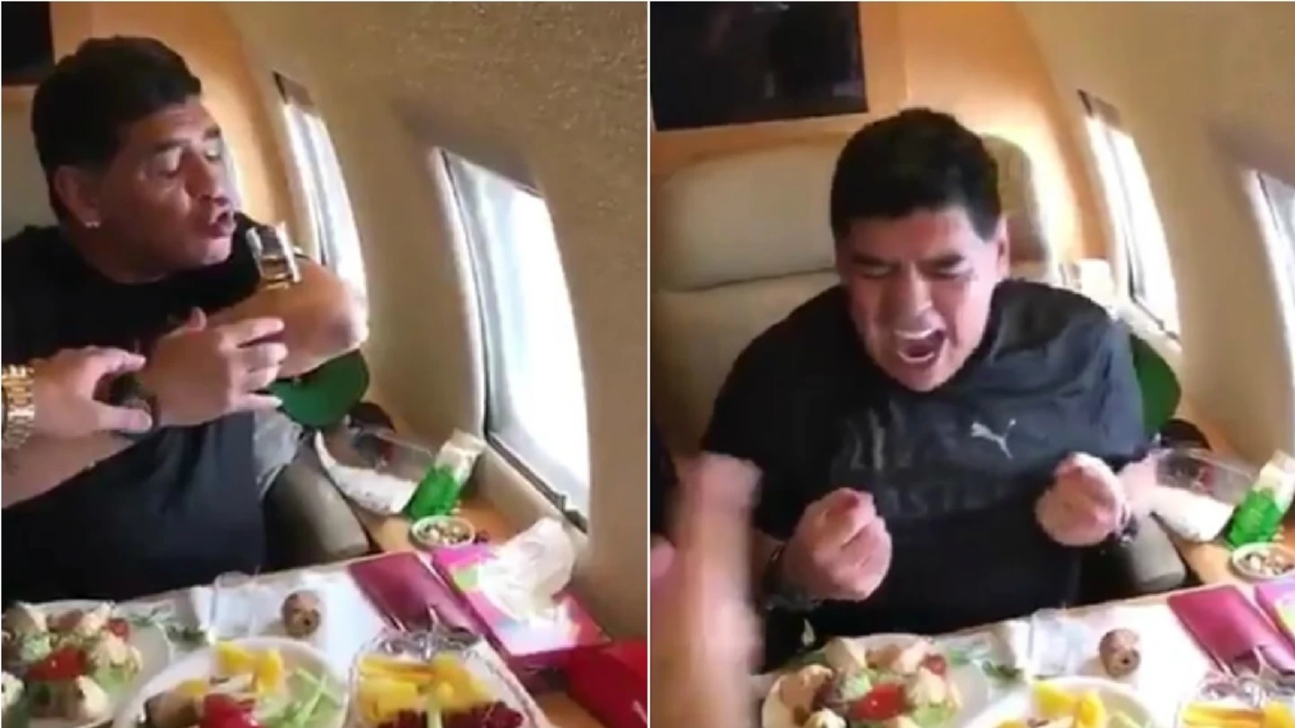 Maradona bebe chupitos en un avión Maradona bebe chupitos en un avión