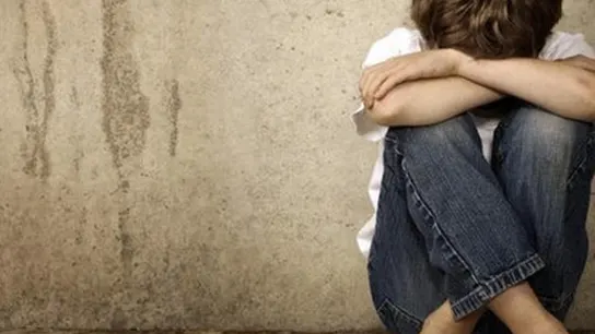 Imagen de un niño víctima de maltrato Imagen de un niño víctima de maltrato
