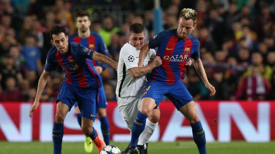 Verrati y Rakitic durante un partido