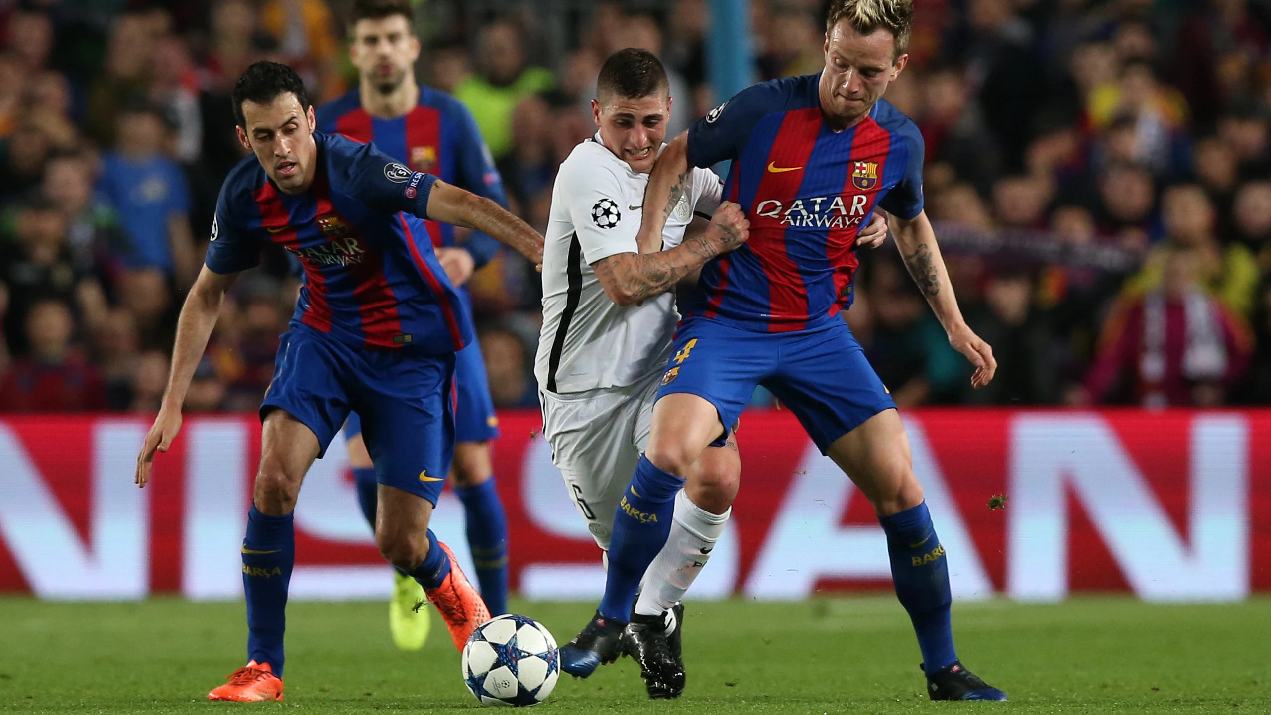 Verrati y Rakitic durante un partido