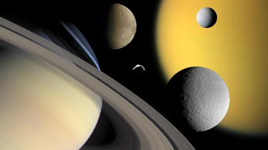 Saturno y algunos satélites, entre ellos Titán Saturno y algunos satélites, entre ellos Titán