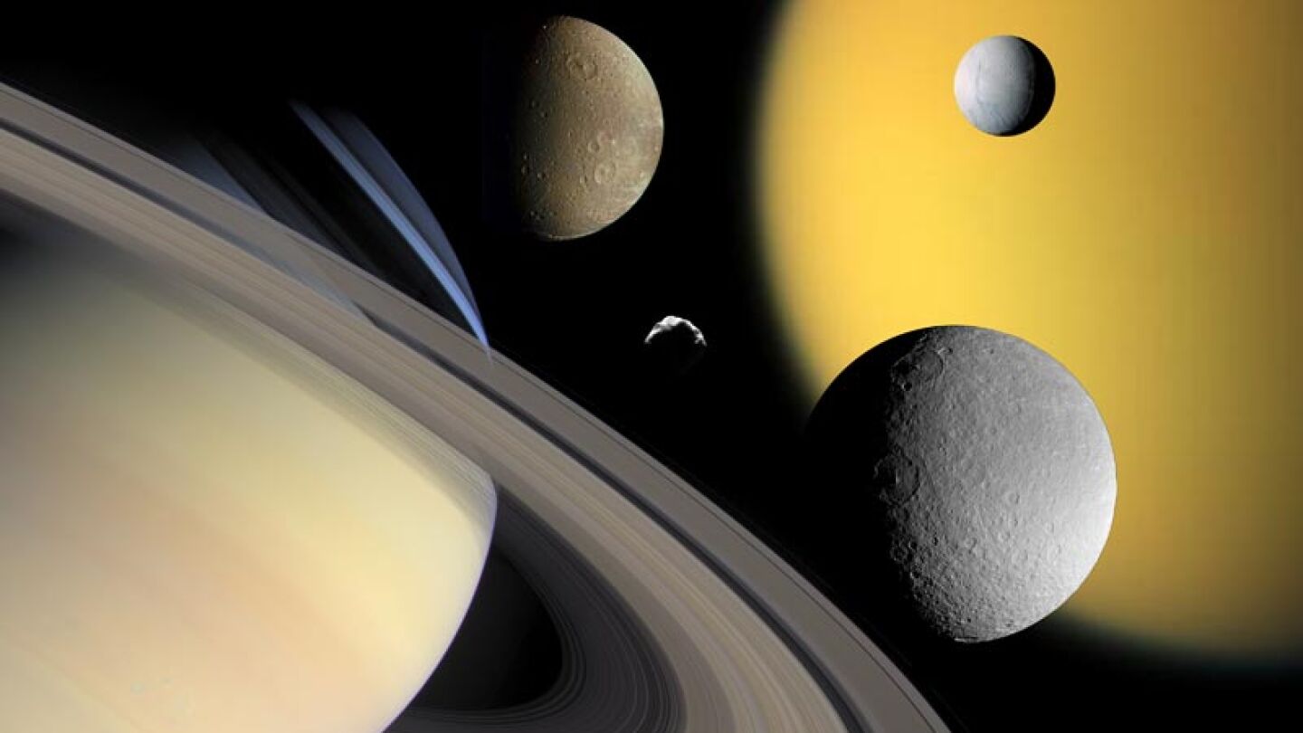 Saturno y algunos sat&eacute;lites, entre ellos Tit&aacute;n