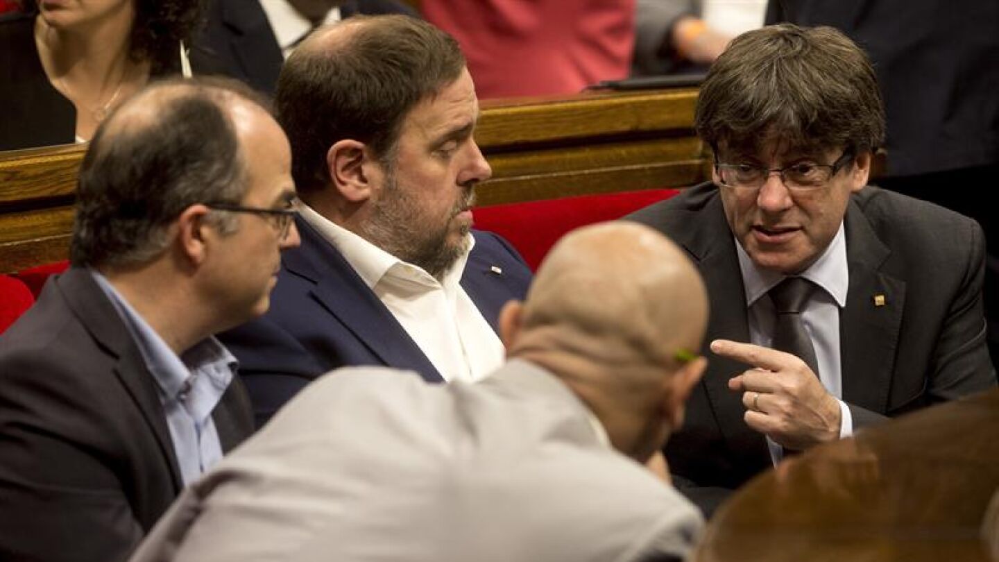 Carles Puigdemont y Oriol Junqueras