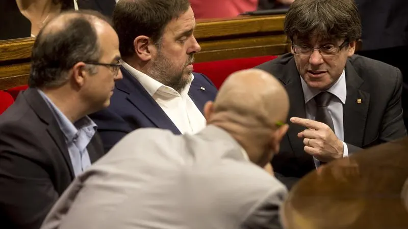 Carles Puigdemont y Oriol Junqueras