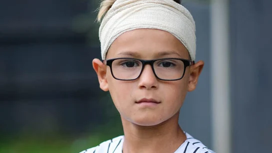 El pequeño Romeo Smith, recuperándose de la agresión El pequeño Romeo Smith, recuperándose de la agresión