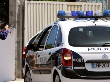 Un coche de la Policía Nacional en una imagen de archivo Un coche de la Policía Nacional en una imagen de archivo