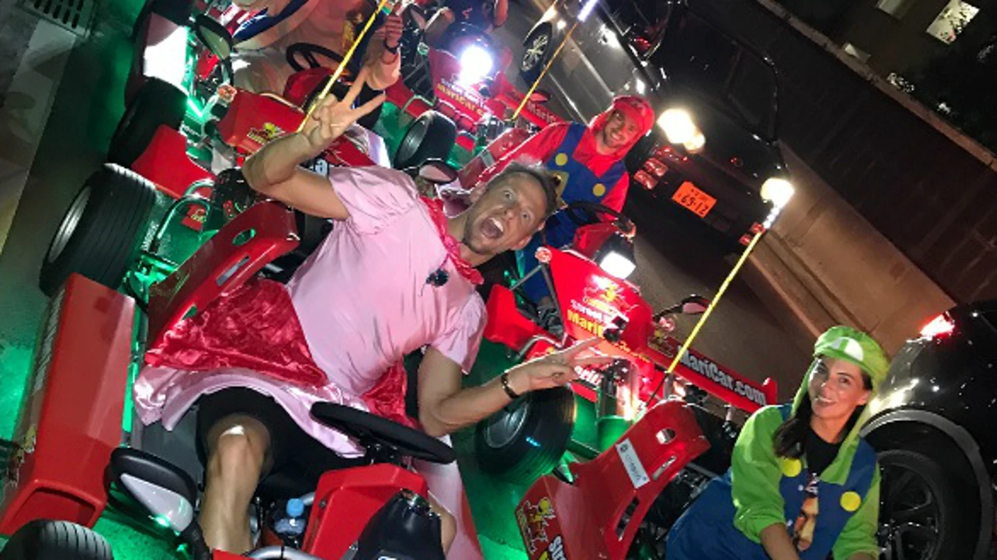 Jenson Button, disfrazado de Princesa Peach Jenson Button, disfrazado de Princesa Peach