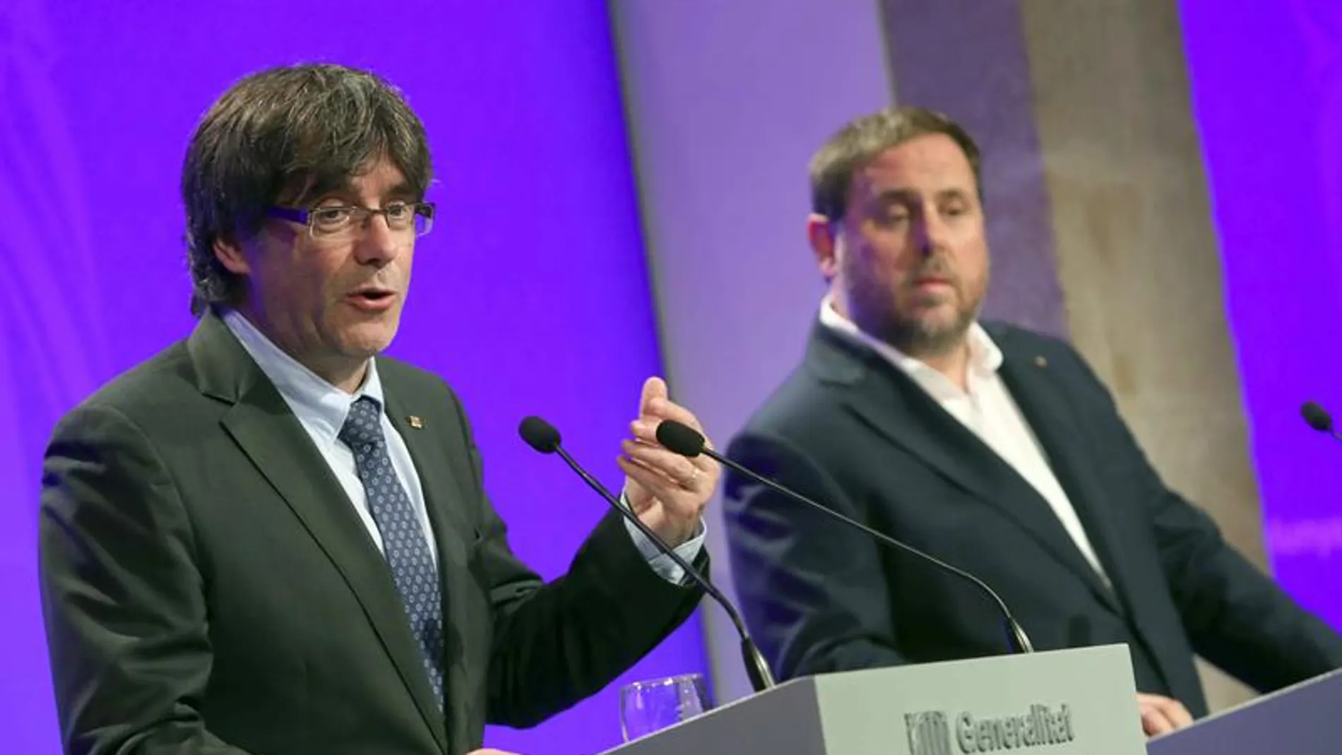 Carles Puigdemont y Oriol Junqueras durante la rueda de prensa