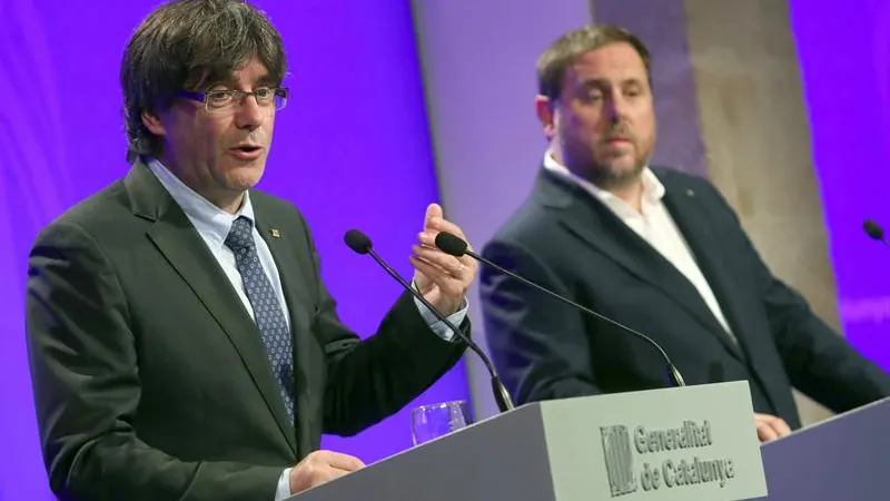 Carles Puigdemont y Oriol Junqueras durante la rueda de prensa