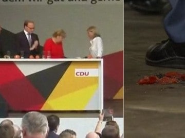 Lanzan varios tomates a Angela Merkel Lanzan varios tomates a Angela Merkel