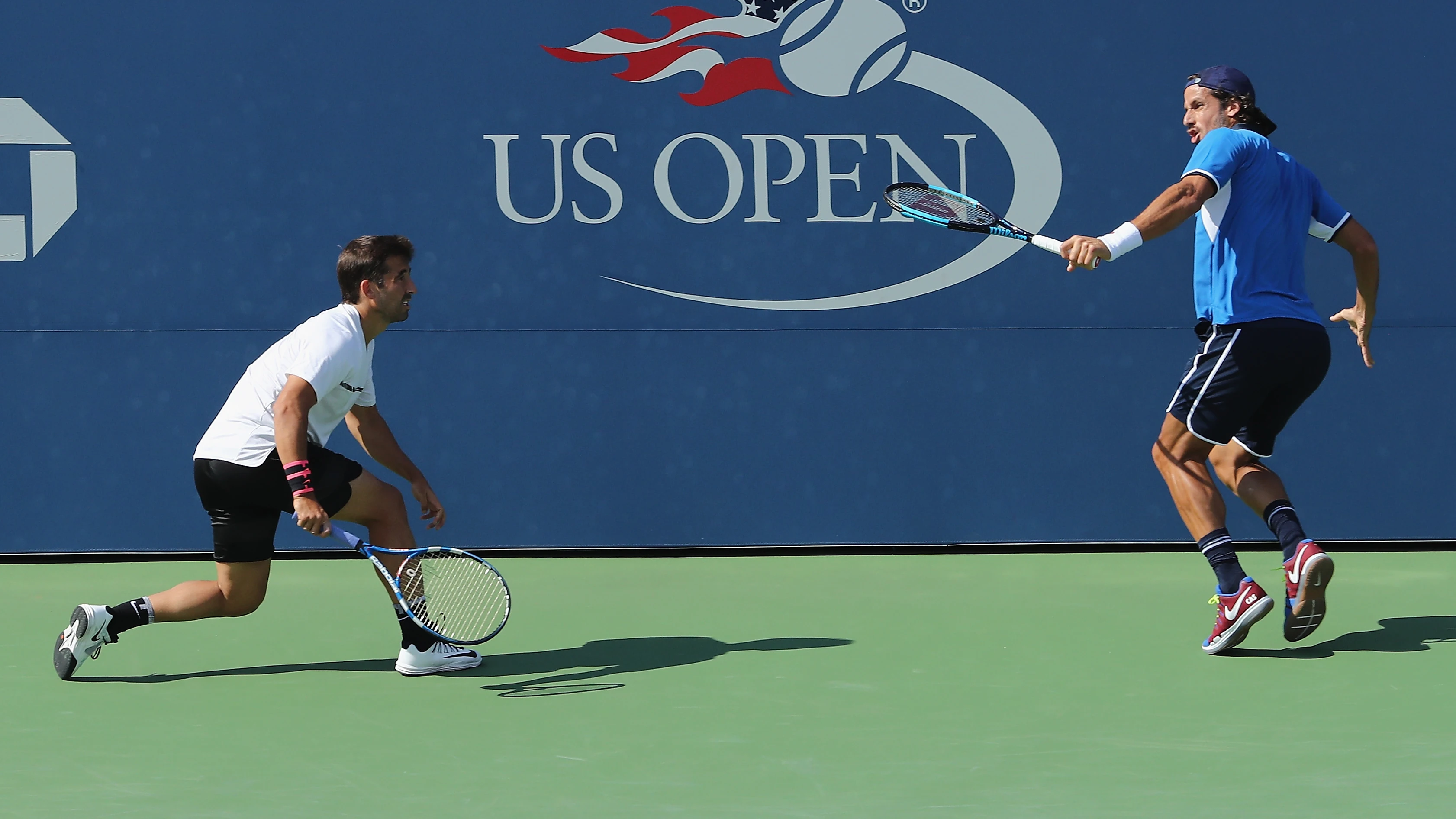 Marc López y Feliciano López, en acción durante el US Open