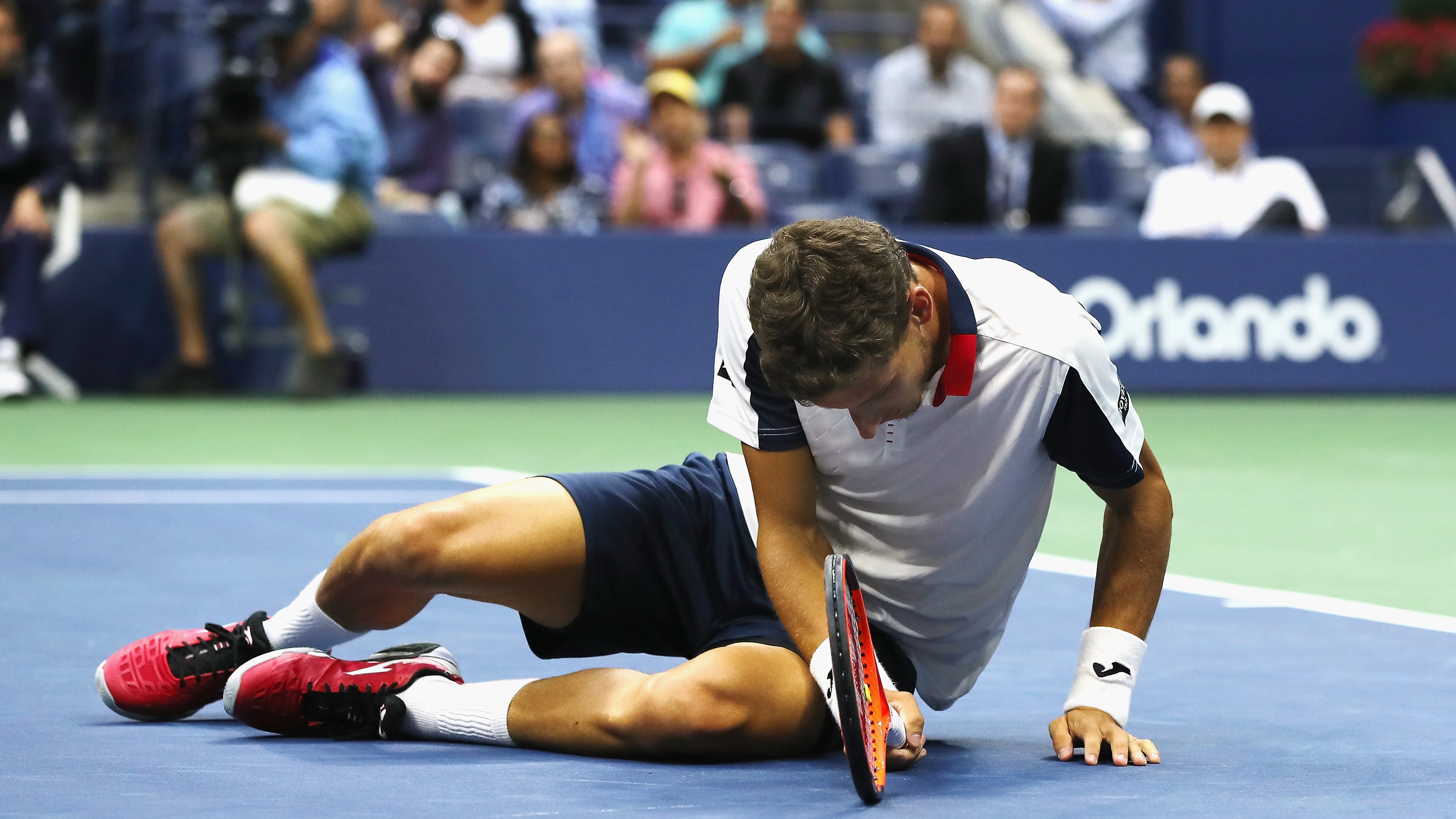 Pablo Carreño, en el suelo tras un punto en su partido contra Anderson