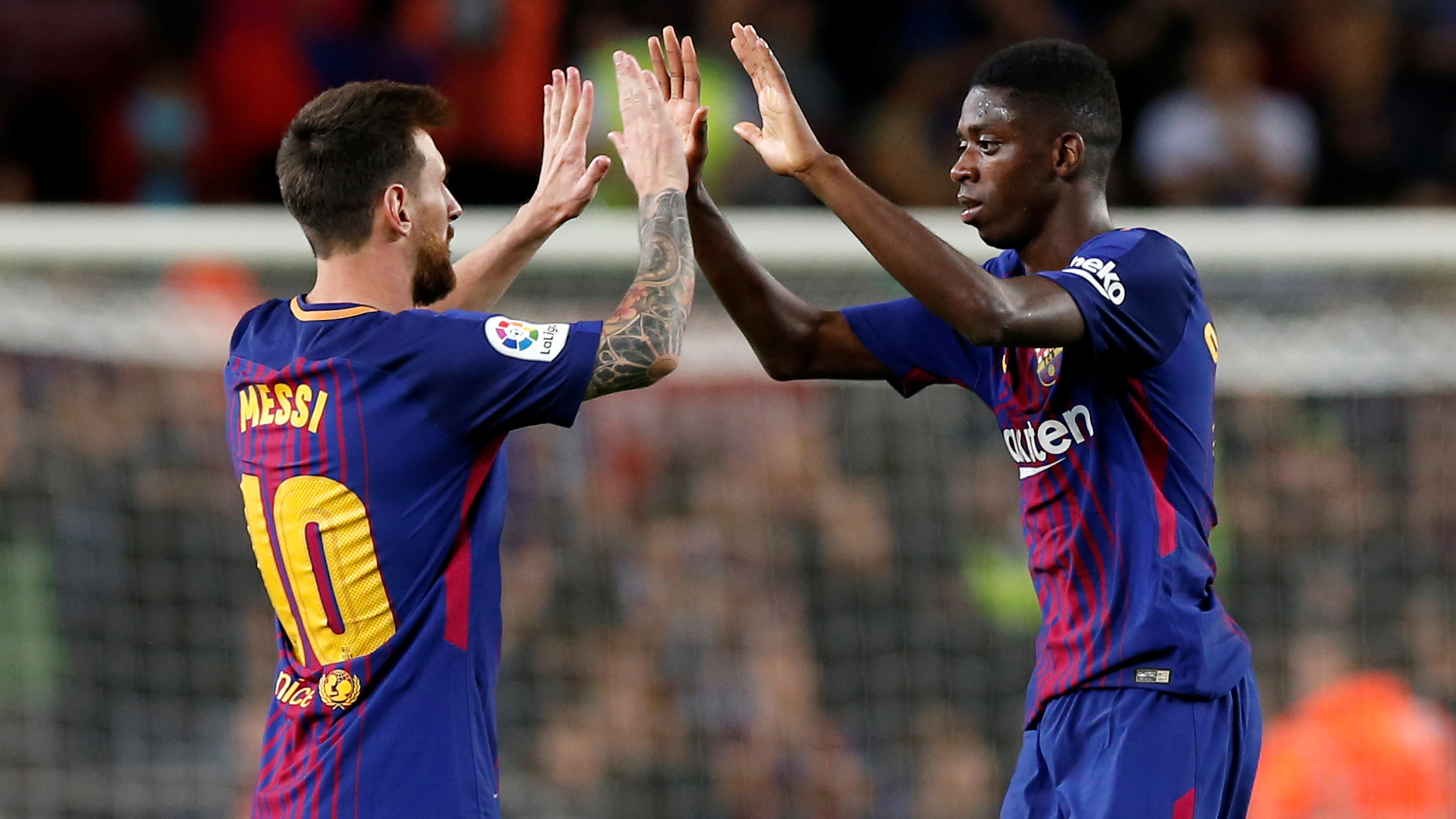 Messi con Dembelé 