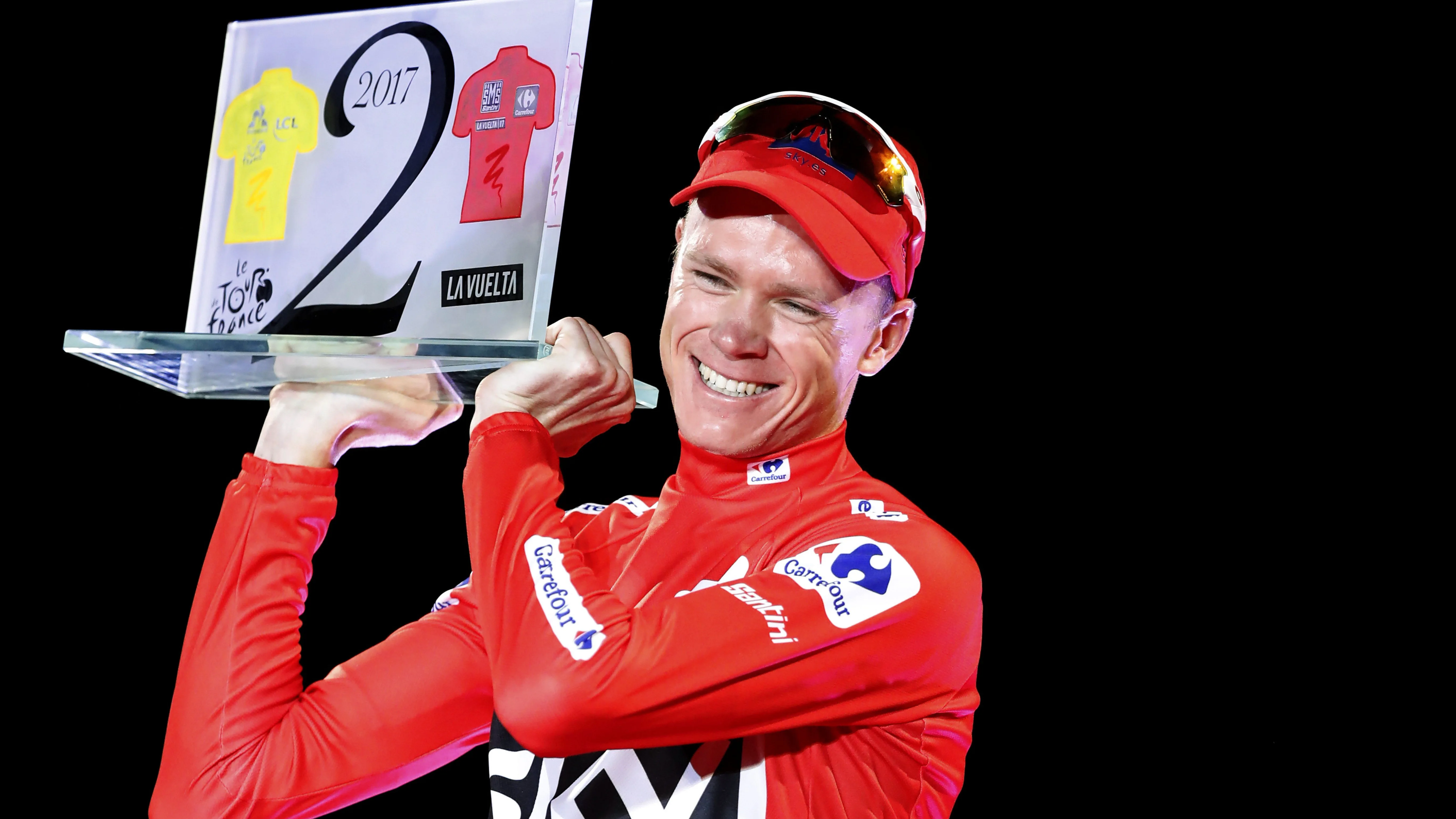 Chris Froome, con el trofeo de campeón de la Vuelta a España