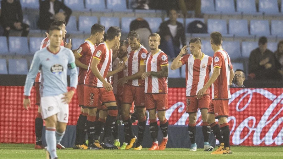 El Girona celebra en grupo uno de los goles contra el Celta