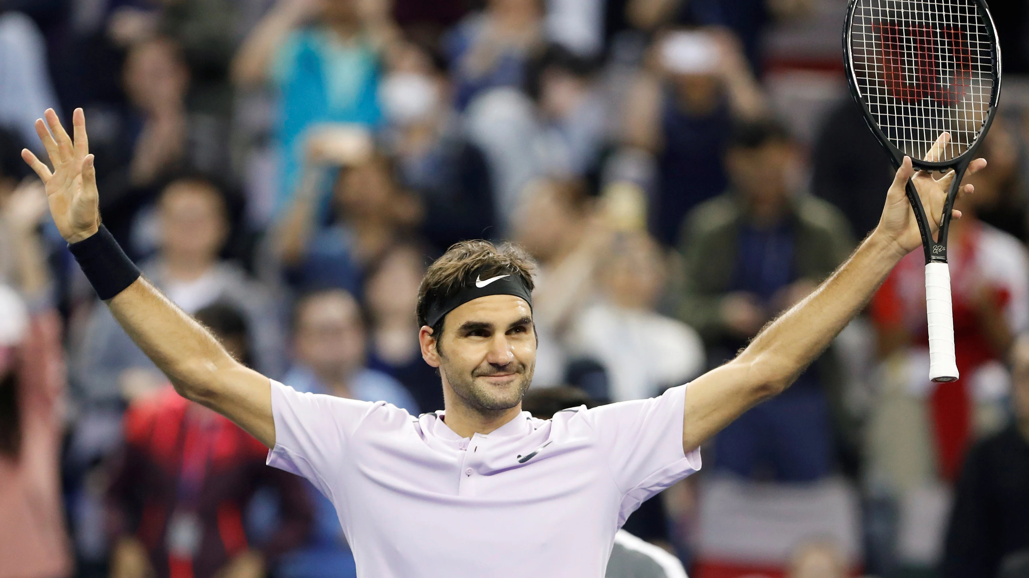 Federer celebra la victoria contra Del Potro