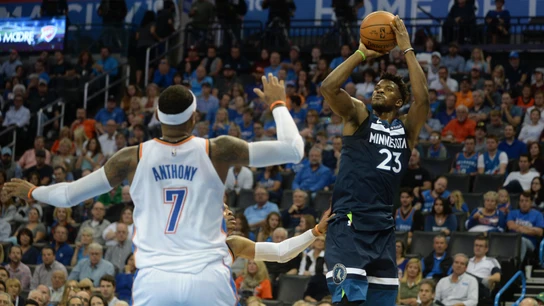 Butler lanza a canasta ante la defensa de Carmelo Anthony Butler lanza a canasta ante la defensa de Carmelo Anthony
