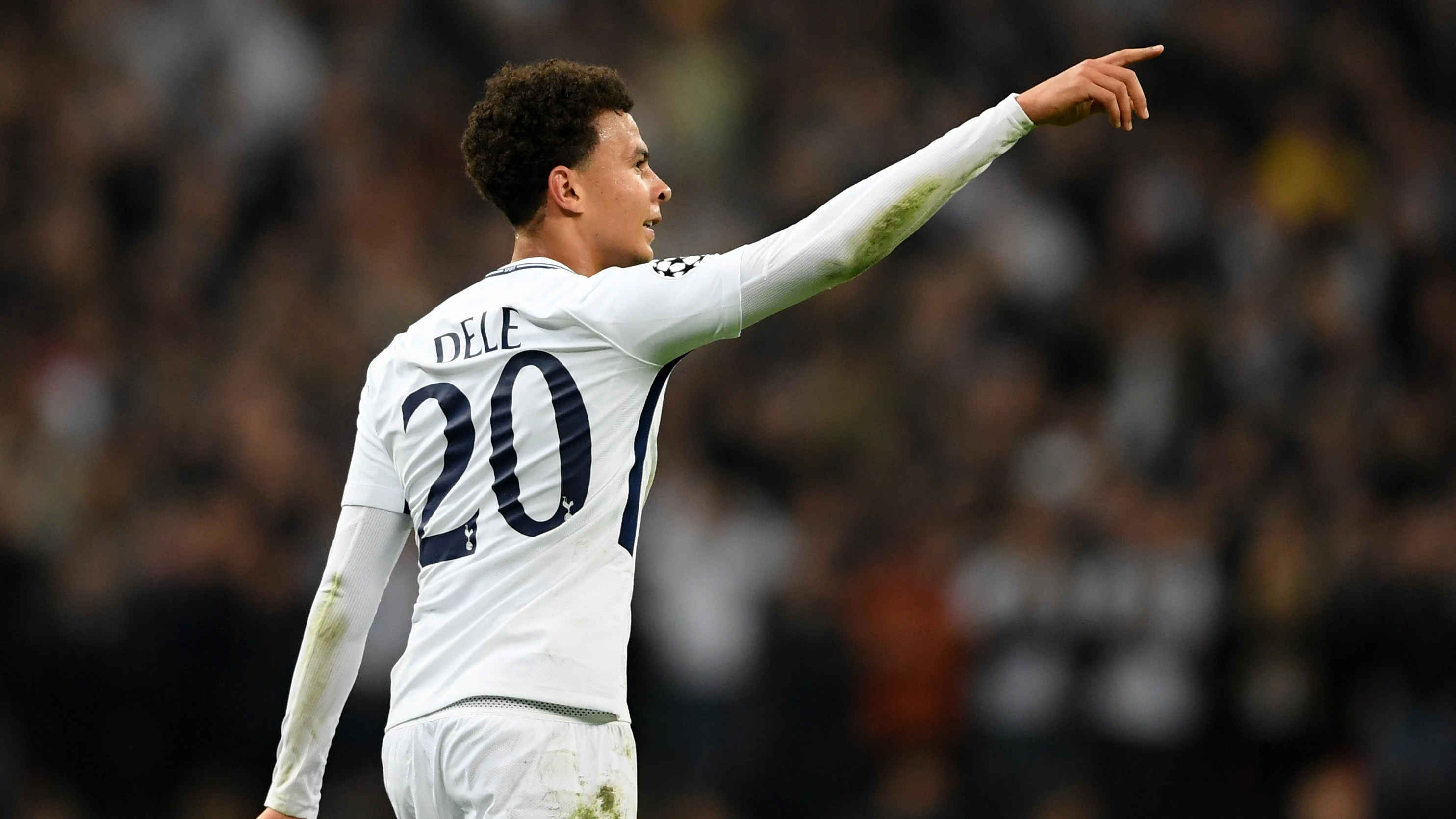 Dele Alli celebra uno de sus goles al Real Madrid