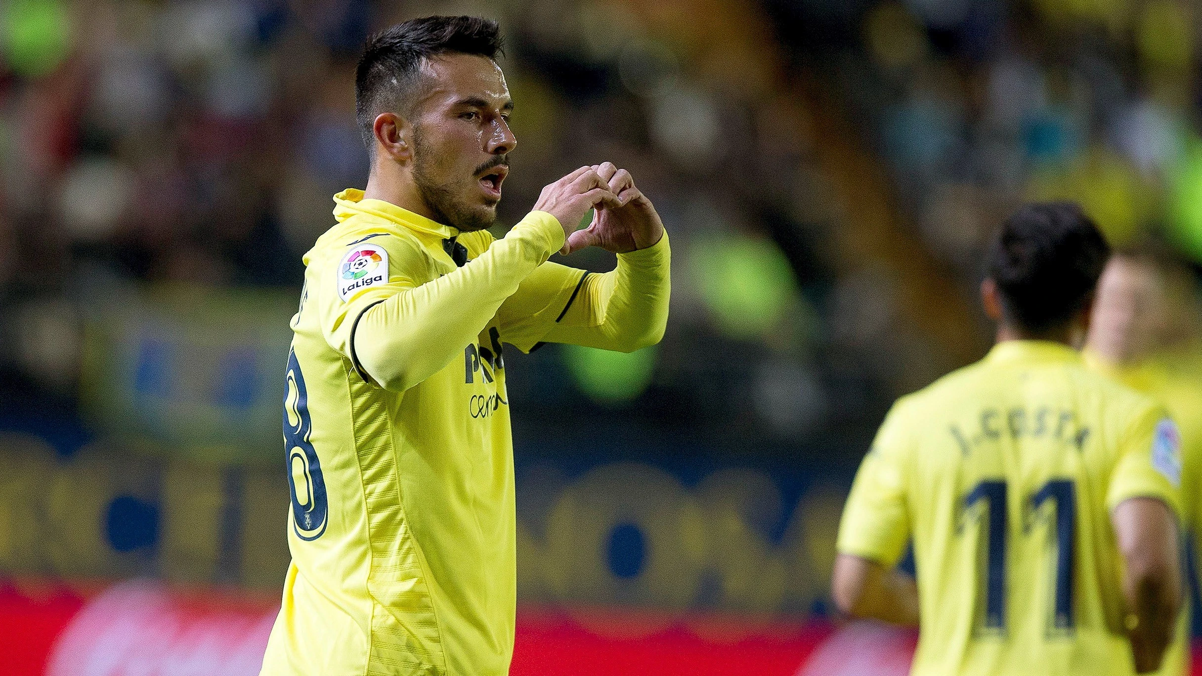 Sansone celebra uno de sus goles ante el Málaga