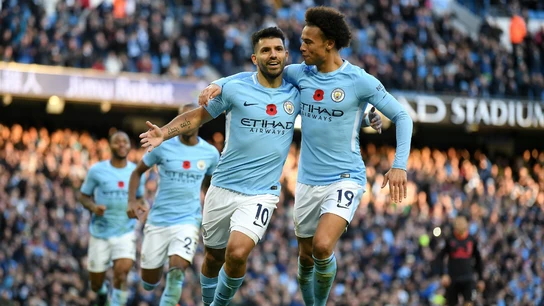 Agüero celebra un gol con Sane Agüero celebra un gol con Sane