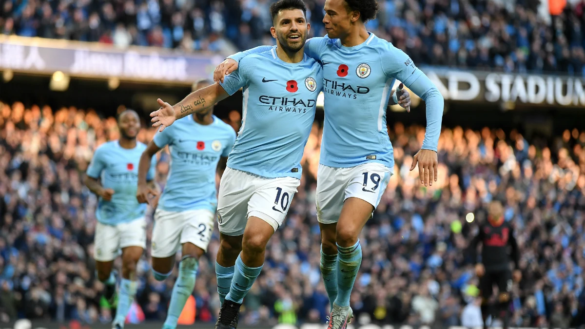 Agüero celebra un gol con Sane