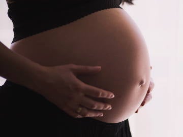 Imagen de archivo de una mujer embarazada Imagen de archivo de una mujer embarazada