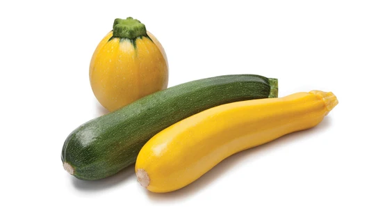Un calabacín amarillo y otro verde Un calabacín amarillo y otro verde