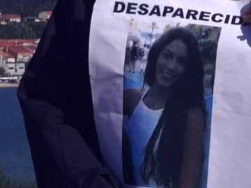 Un cartel con la imagen de Diana Quer durante su búsqueda en agosto de 2016 Un cartel con la imagen de Diana Quer durante su búsqueda en agosto de 2016
