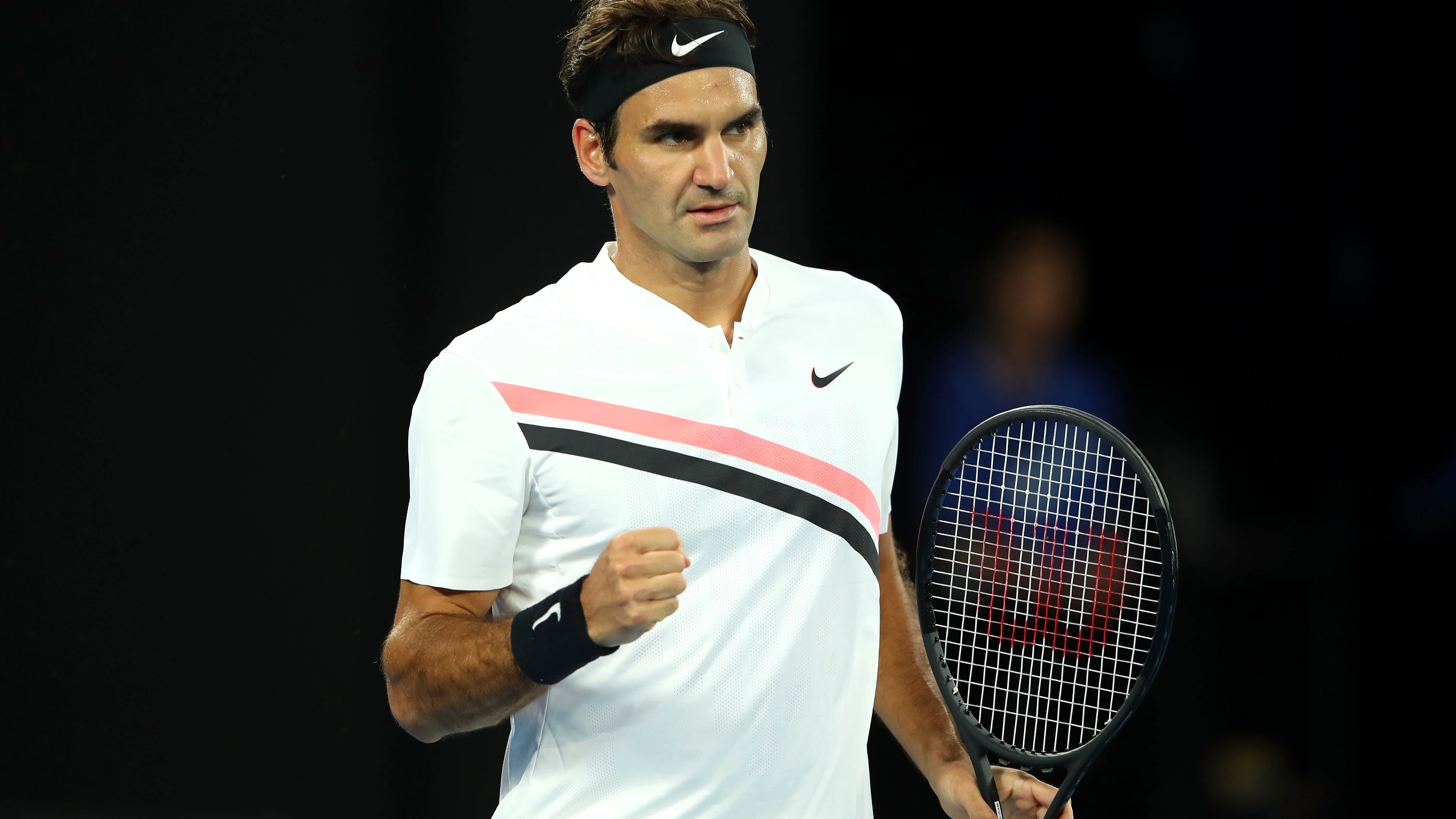 Federer celebra la consecución de un punto ante Berdych