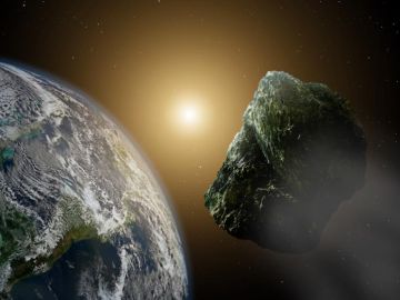 Recreación artística de un asteroide pasando por las cercanías de nuestro planeta