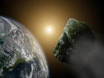 Recreación artística de un asteroide pasando por las cercanías de nuestro planeta Recreación artística de un asteroide pasando por las cercanías de nuestro planeta