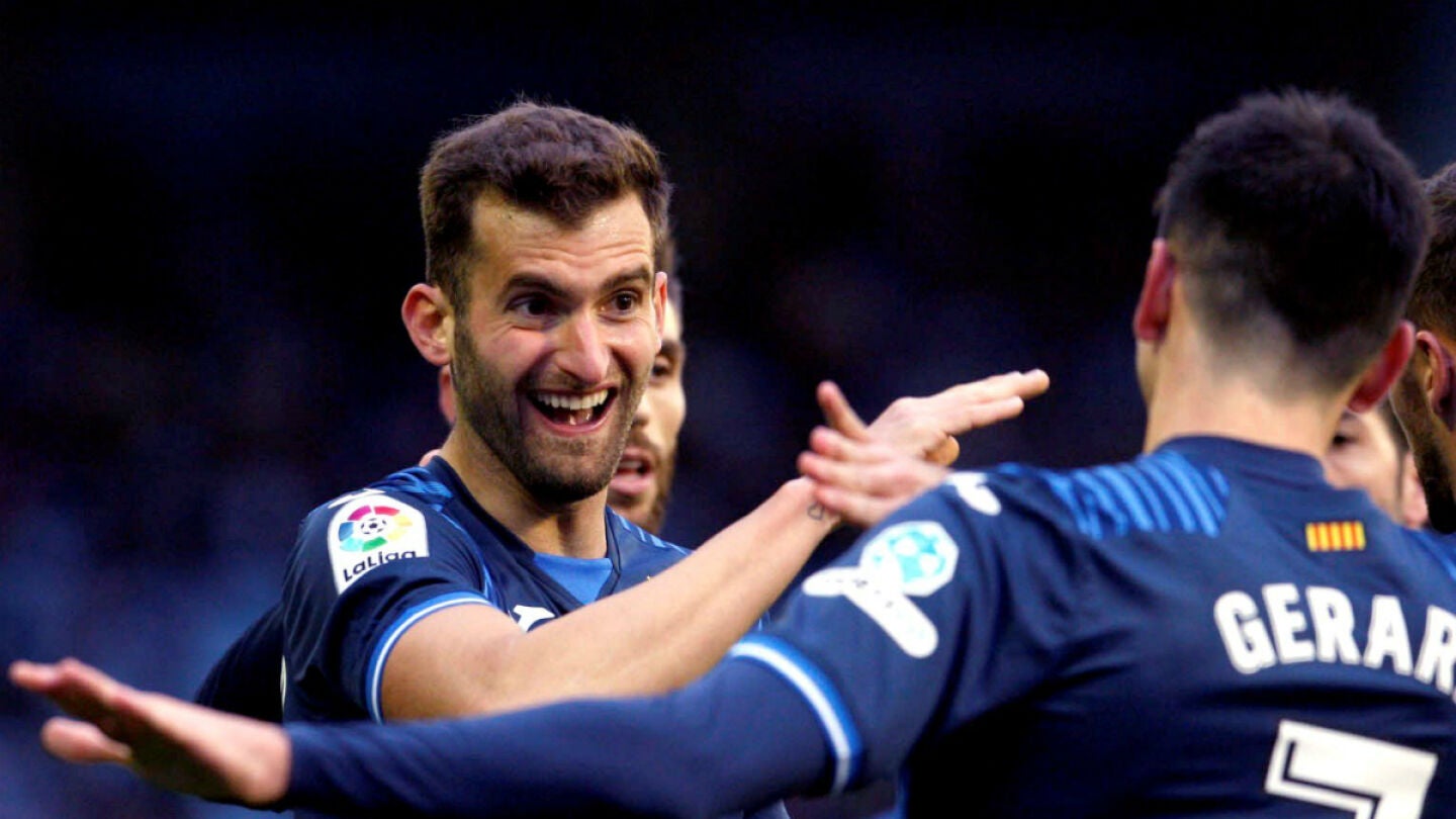 Baptistao celebra un gol con Gerard Moreno
