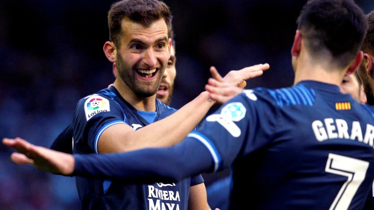 Baptistao celebra un gol con Gerard Moreno