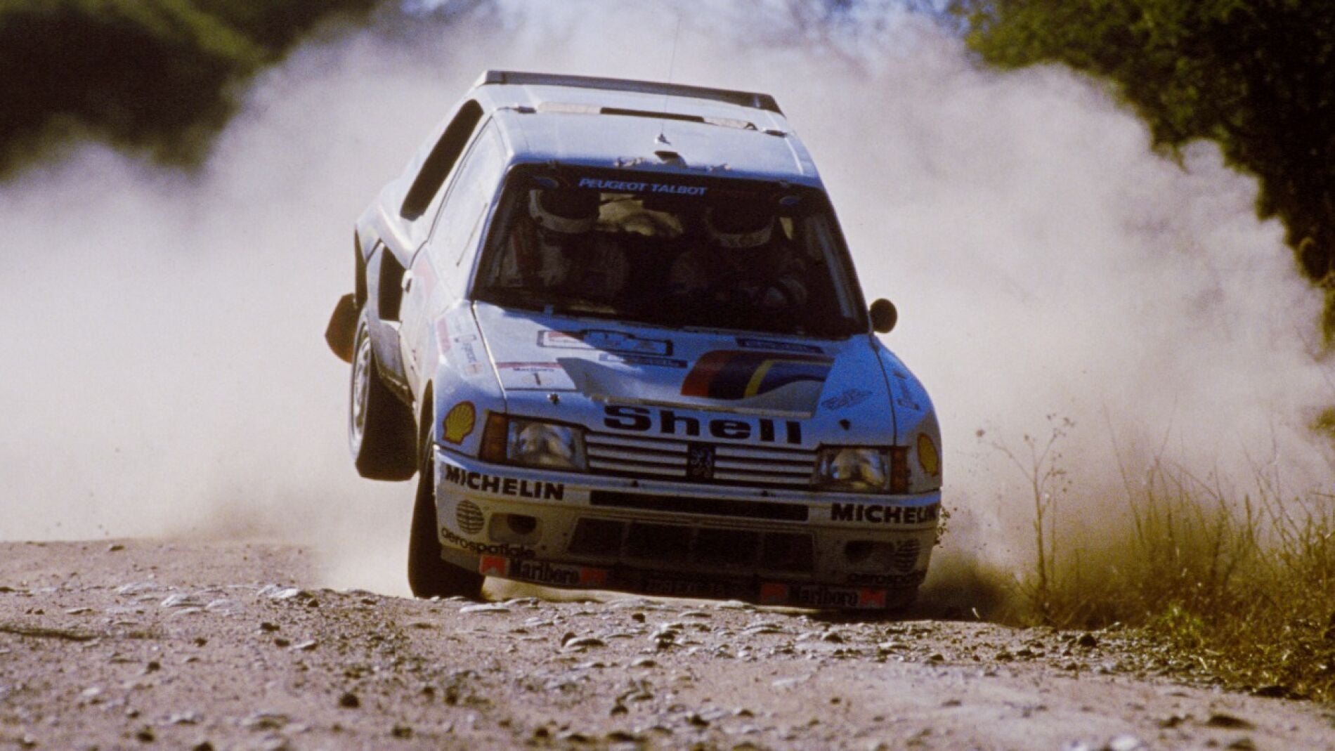 CarlosReutemannWRCPeugeot1985.jpg