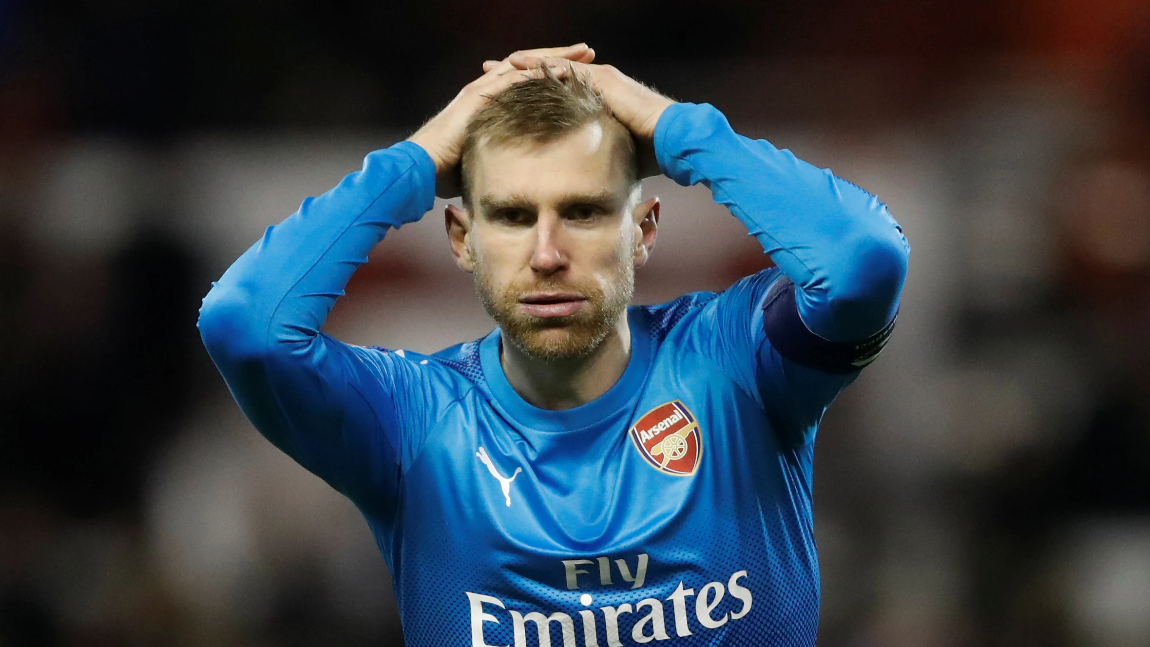 Mertesacker con el Arsenal