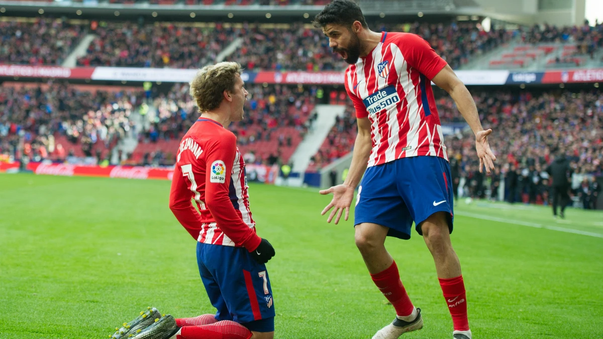 Griezmann celebra un gol con Diego Costa