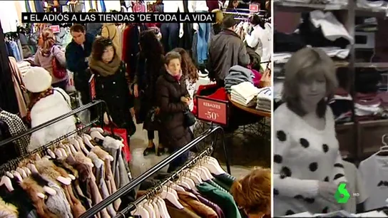 Imagen de una gran superficie y de un pequeño comercio Imagen de una gran superficie y de un pequeño comercio