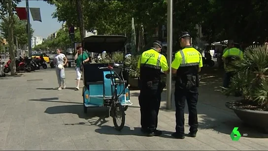 Multa a un bicitaxi en la ciudad de Barcelona Multa a un bicitaxi en la ciudad de Barcelona