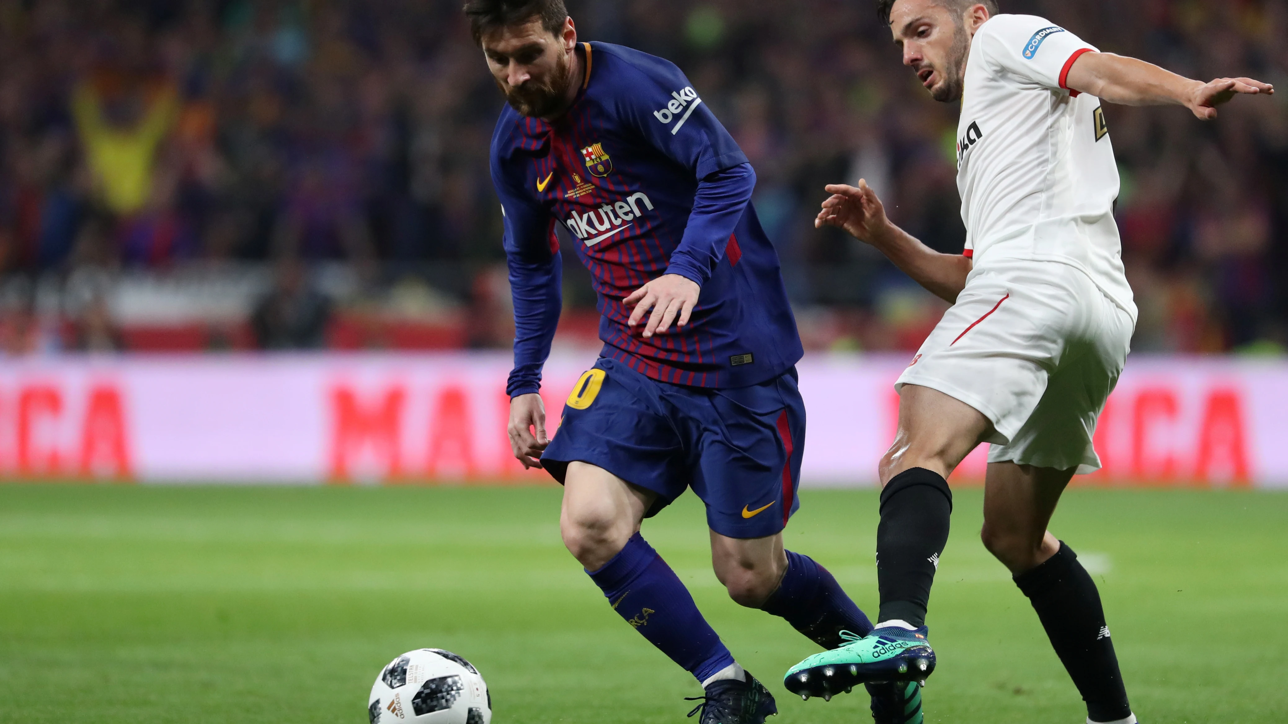 Messi y Sarabia durante un partido