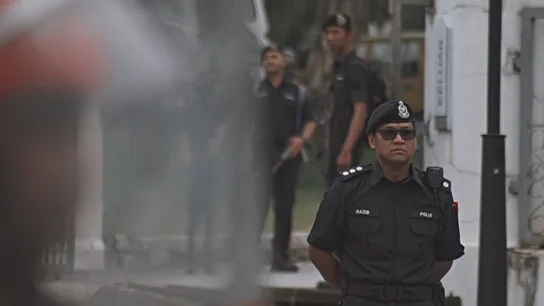 Un policía en Malasia Un policía en Malasia