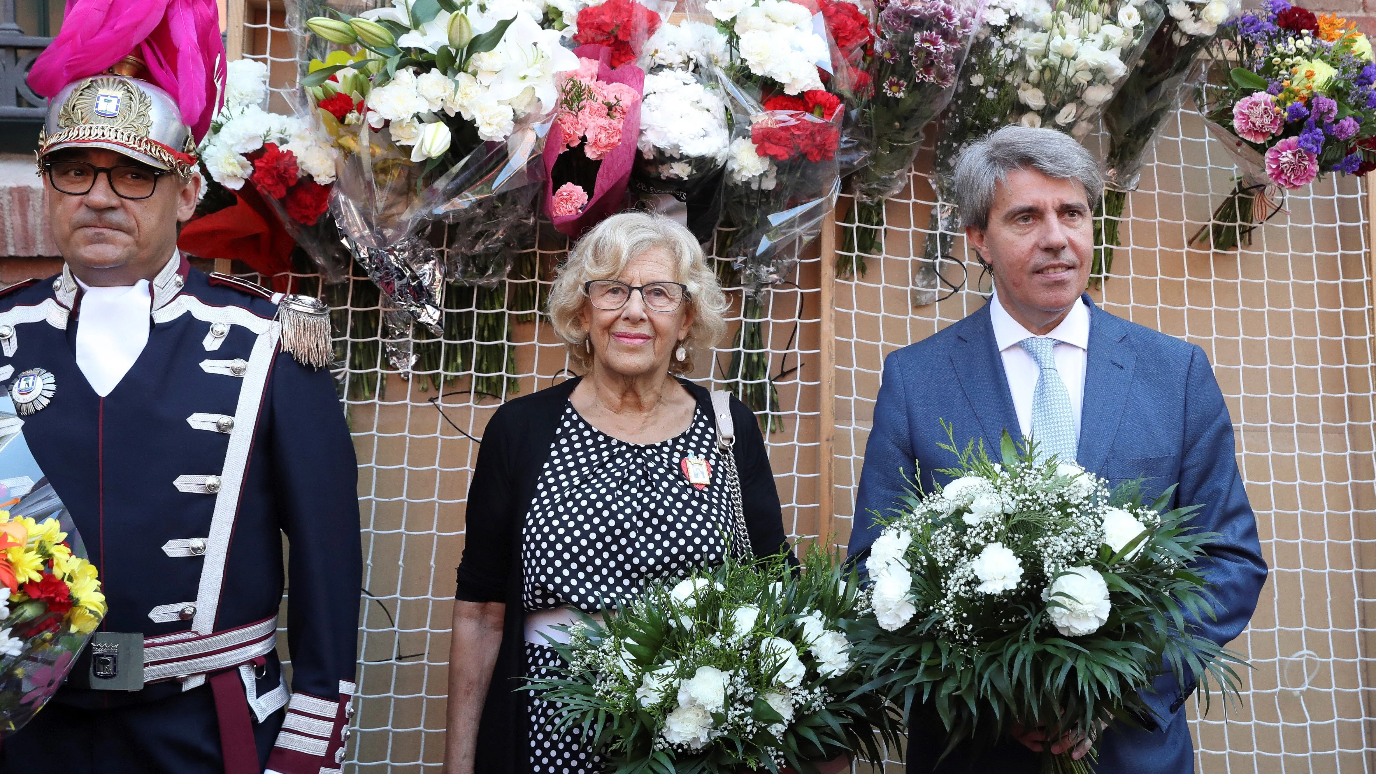 Manuela Carmena y Ángel Garrido asisten a los actos con motivo de las fiestas de la Virgen de la Paloma.