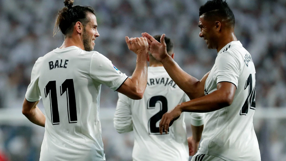 Bale y Casemiro celebran un gol