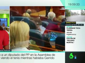 Graban a un diputado del PP en la Asamblea de Madrid viendo el tenis mientras hablaba Garrido Graban a un diputado del PP en la Asamblea de Madrid viendo el tenis mientras hablaba Garrido