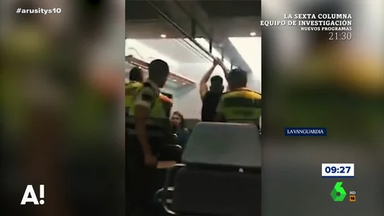 Un guarda de seguridad se muestra agresivo Un guarda de seguridad se muestra agresivo