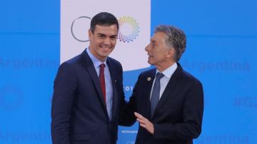 Sánchez junto a Mauricio Macri en la cumbre del G20