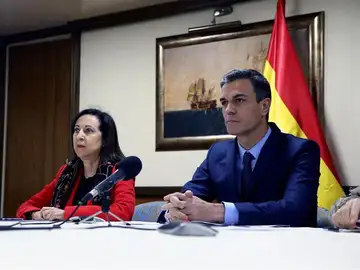 El presidente del Gobierno, Pedro Sánchez y Margarita Robles