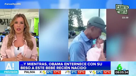 Barack Obama besa a un bebé Barack Obama besa a un bebé