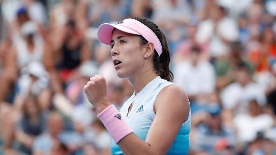 Garbi&ntilde;e Muguruza celebra un punto en su estreno en el Open de Australia